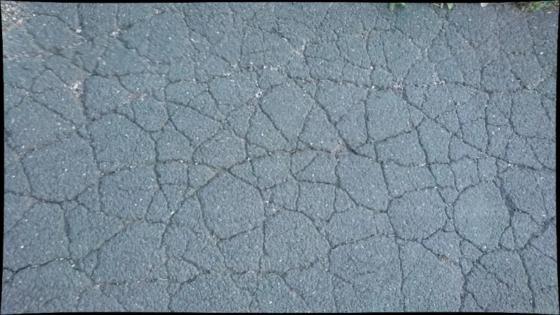 Photograph of cracked pavement